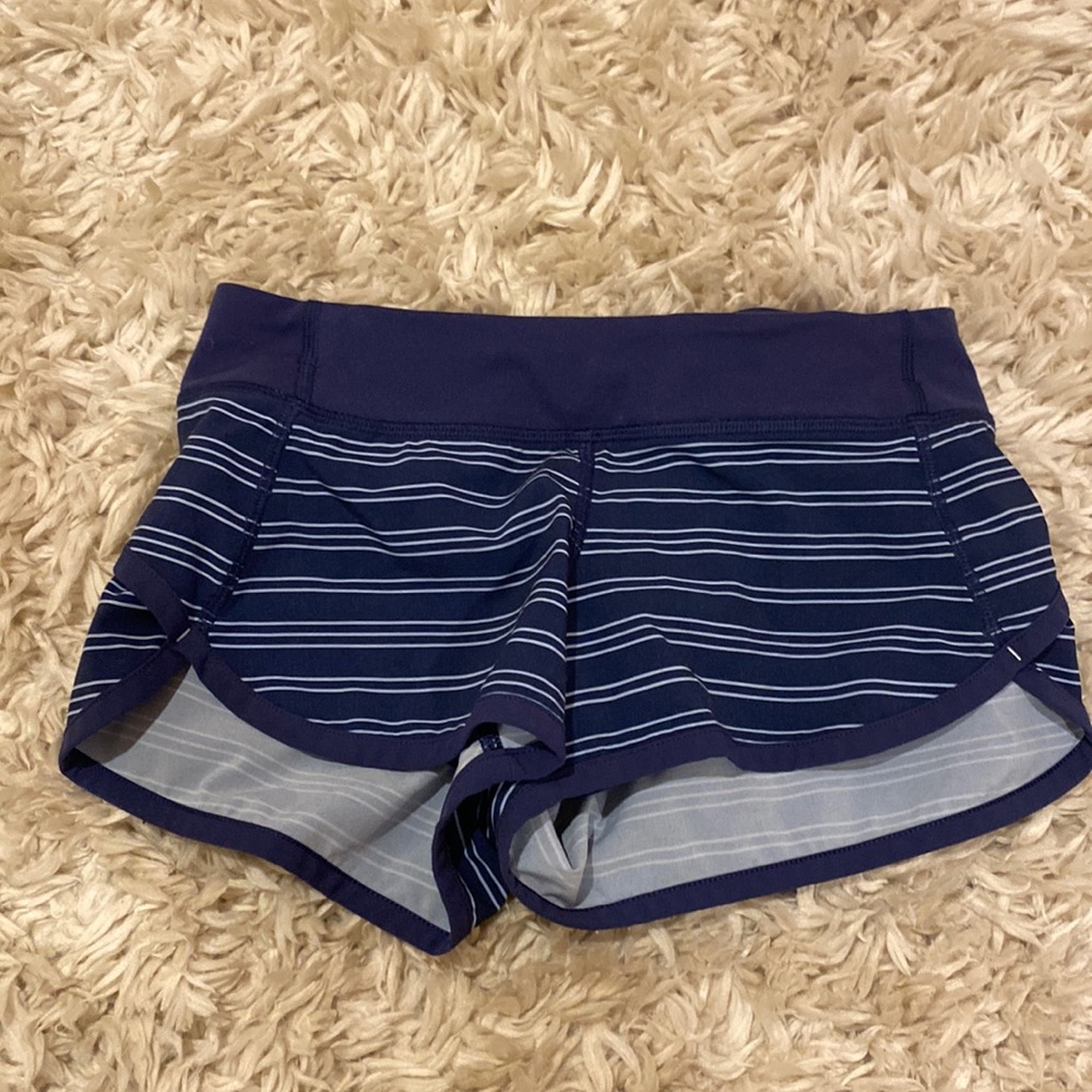 blue and white striped ivivva shorts size 8